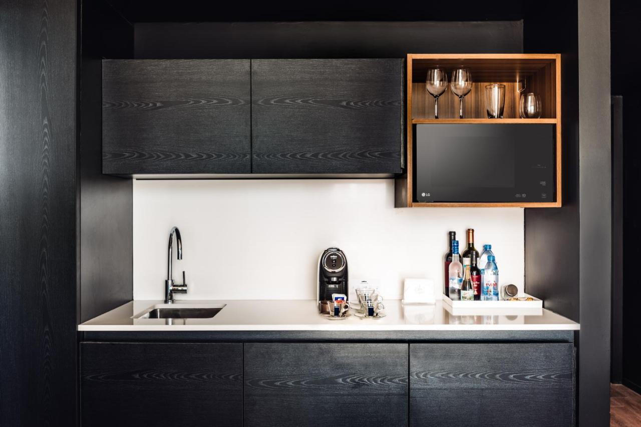 Sls Buenos Aires Puerto Madero酒店 外观 照片 A wet bar in a hotel room